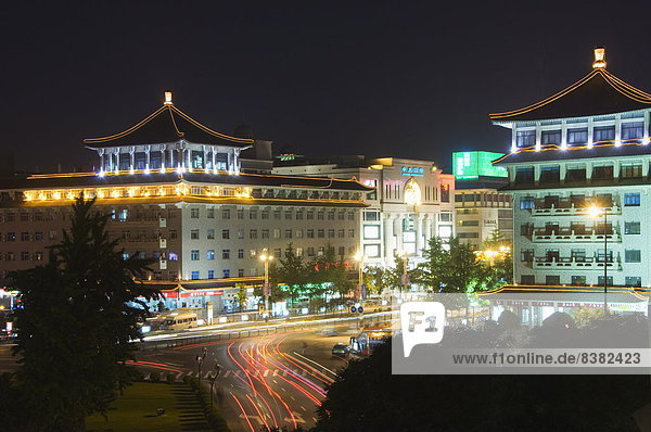 Chinese style hotel building and city lights  Xian City Shaanxi Province  China  Asia