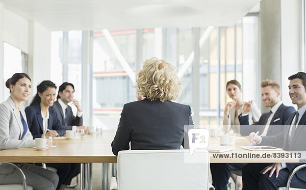 Business people talking in meeting