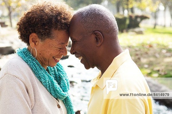 Senior couple face to face  smiling