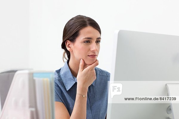 Young woman working on computer