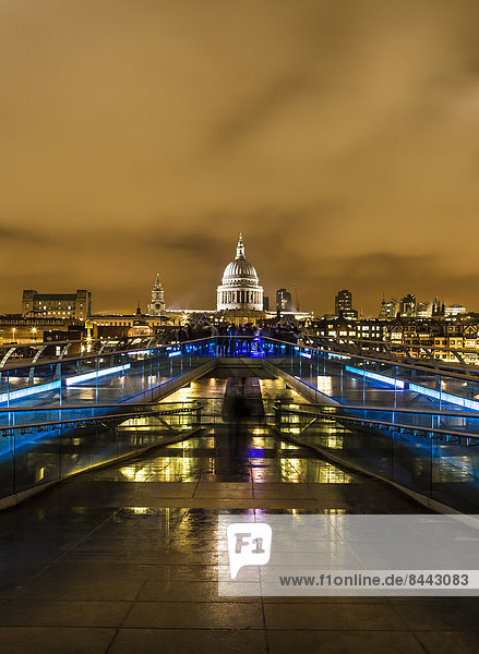 UK  London  view from Millennium Bridge to illuminated St Pauls Cathedral