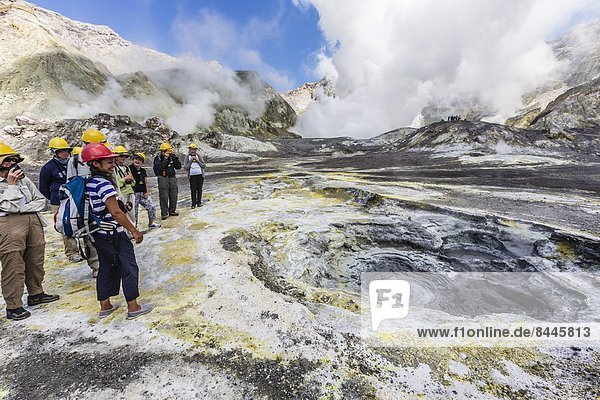 Visitors at an active andesite stratovolcano on White Island  North Island  New Zealand  Pacific