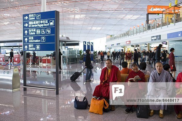 Buddhist monks in Terminal Three of Beijing Capital International Airport  China