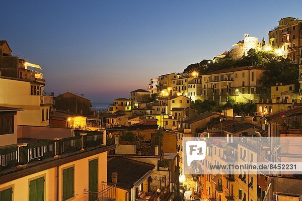 Riomaggiore rooftops and the Castle at dusk  Cinque Terre  UNESCO World Heritage Site  Liguria  Italy  Mediterranean  Europe