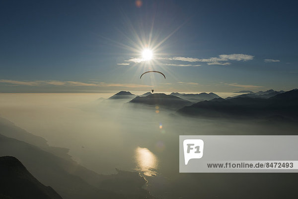 Paragliding  clouds  inversions  Lake Garda  Veneto  Italy