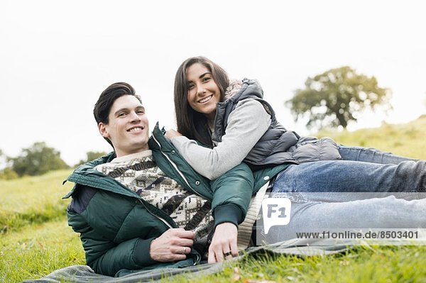 Young couple resting in park