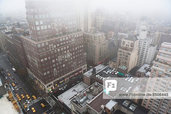 High angled cityscape in mist  New York City  USA