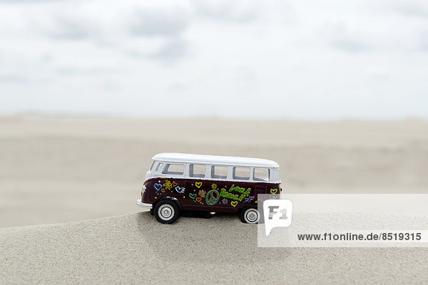 Germany  Amrum  Toy bus on dune