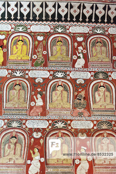 Mural  fresco  colourful painted wall with Buddha images  Lankatilaka Vihara Temple  near Kandy  Central Province  Sri Lanka
