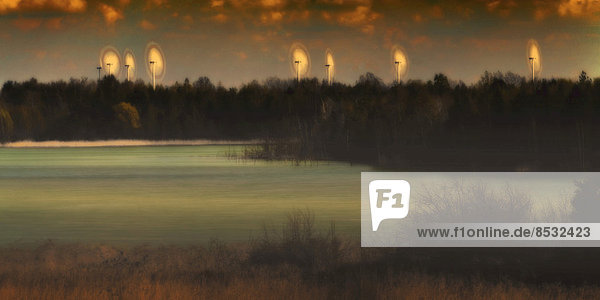 Wind turbines rotating on the edge of a former lignite mine  Lübbenau  Brandenburg  Germany