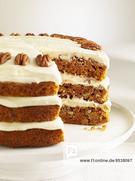 Pecan cake with cream cheese topping