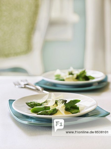 Poached asparagus with hollandaise and parmesan