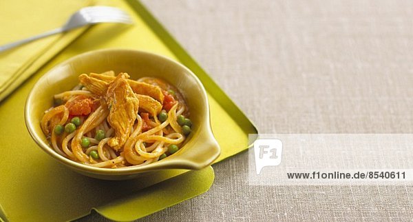 Noodles with curry sauce  chicken and vegetables