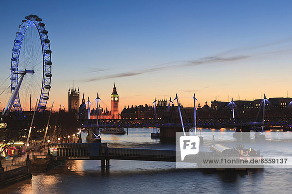 View of the River Thames with the London Eye and the Houses of Parliament at dusk  London  England  United Kingdom