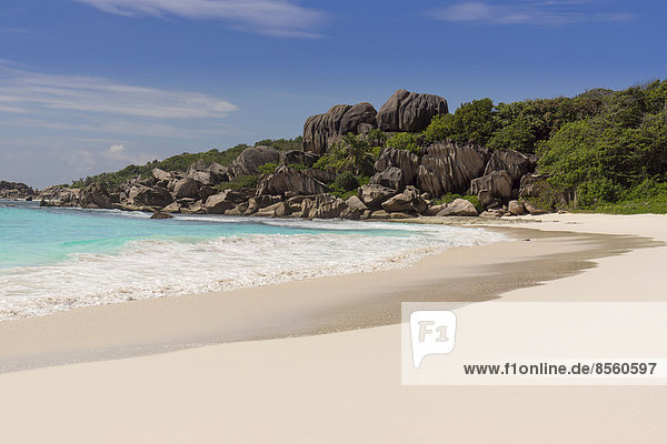Sandy beach with the rock formations typical for the Seychelles  Grand Anse  La Digue  Seychelles