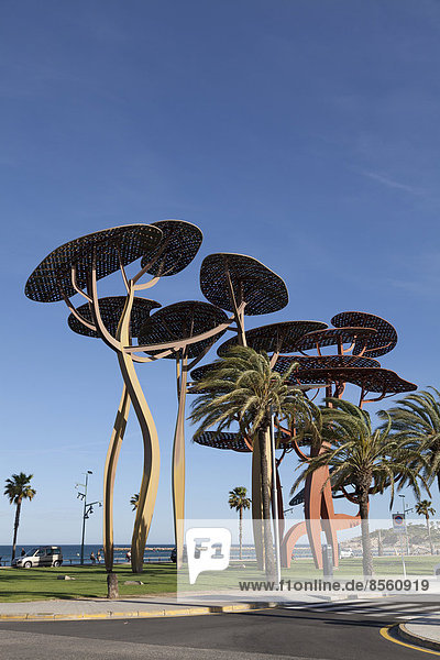 Large pine tree sculpture on the promenade of La Pineda  Platja de la Pineda  Catalonia  Spain