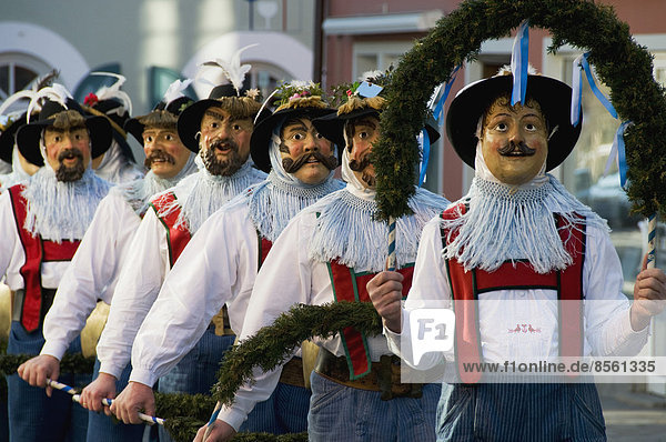 'Schellenrührer or ''Bell shakers''  traditional carnival parade with historical masks and costumes  Murnau  Upper Bavaria  Bavaria  Germany'