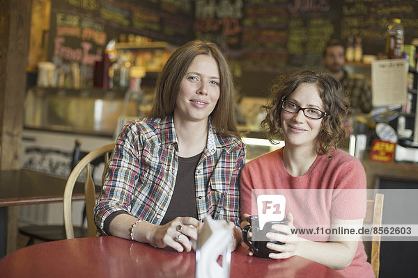 A coffee shop and cafe in High Falls called The Last Bite. Two women sitting at a table.