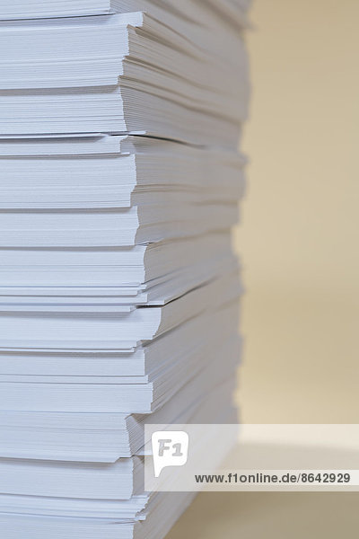 A stack of recycled white paper  paper supplies.