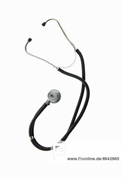 A doctor's stethoscope a diagnostic instrument for assessment of health. Black tubing. Ear pieces and a chest piece.