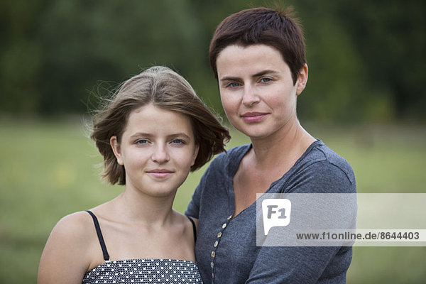 Portrait of mother and daughter  close-up