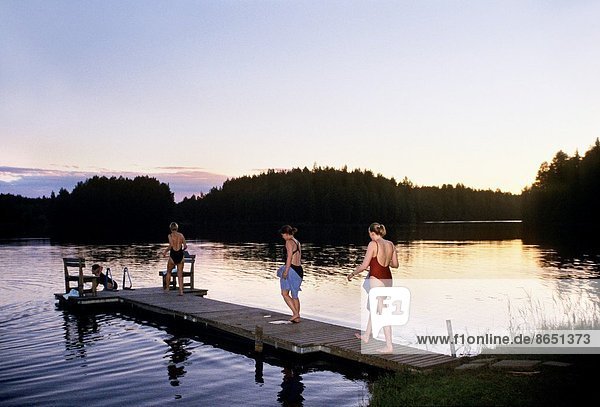 bathing after sauna  Viitakko resort  Tuusniemi  around Kuopio  region of Northern Savonia  Finland  Northern Europe.