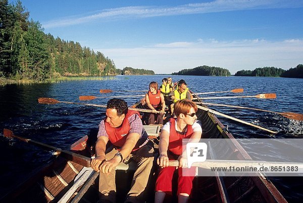 rowing boat trip on a lake in Linnansaari National Park  Savonia region  Finland  Northern Europe.
