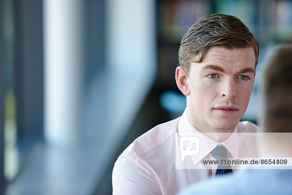 Young businessman in shirt and tie