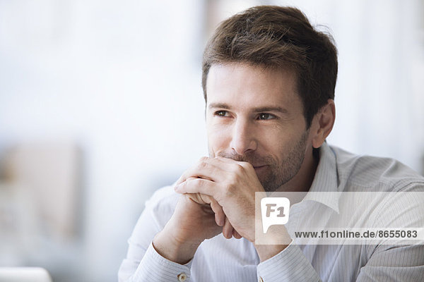 Mid-adult man in thought  portrait
