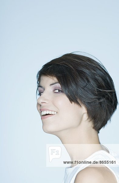 Woman with short hair  smiling  portrait