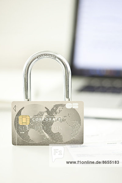 Credit card and lock representing internet security