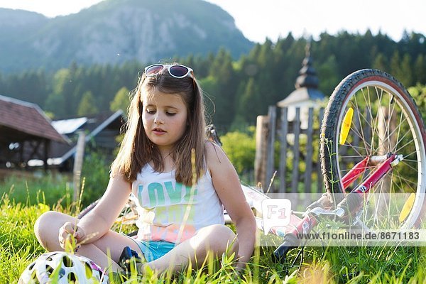 Girl resting and enjoying summer vacations in beautiful countryside  Bohinj Slovenia.