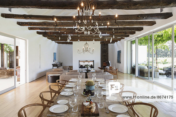 Chandelier over dining table in luxury house