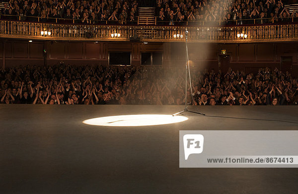 Spotlight shining on stage in theater