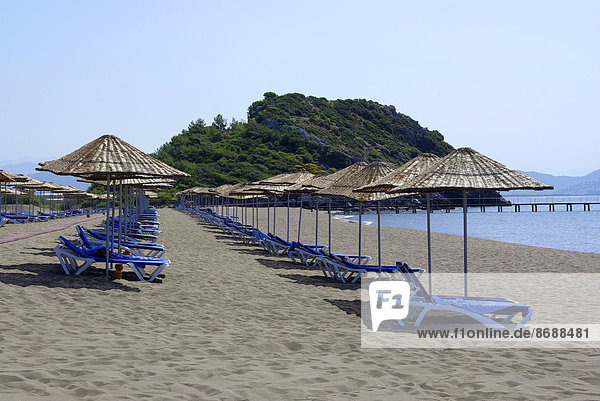 Beach with Sun Loungers and Beach Umbrellas  Mediterranean Sea  Southwestern Turkey