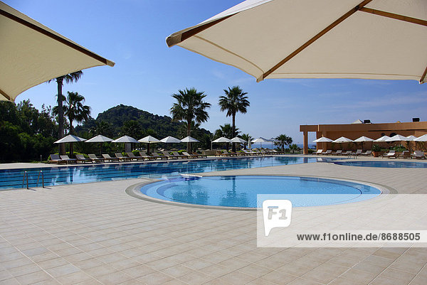 Swimming pool of a hotel with view to beach  Mediterranean Sea  Southwestern Turkey