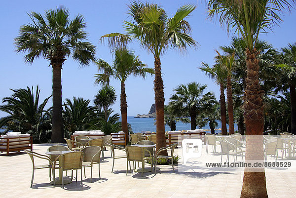 Sitting area of a hotel with view to beach  Mediterranean Sea  Southwestern Turkey