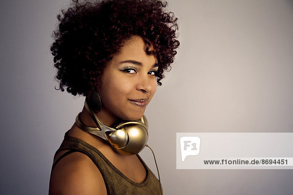 Portrait of female Afro-American with headphones