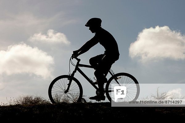 Cyclist riding on bicycle