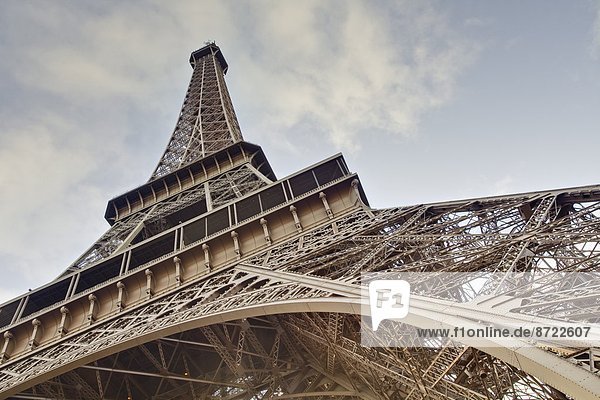 The Eiffel Tower towers overhead  Paris  France  Europe