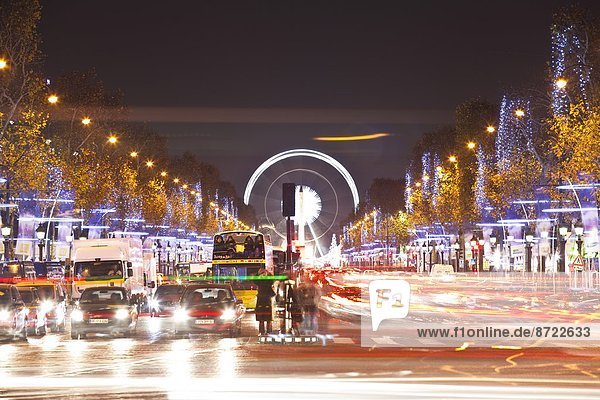 The Champs Elysees lit up by Christmas lights  Paris  France  Europe