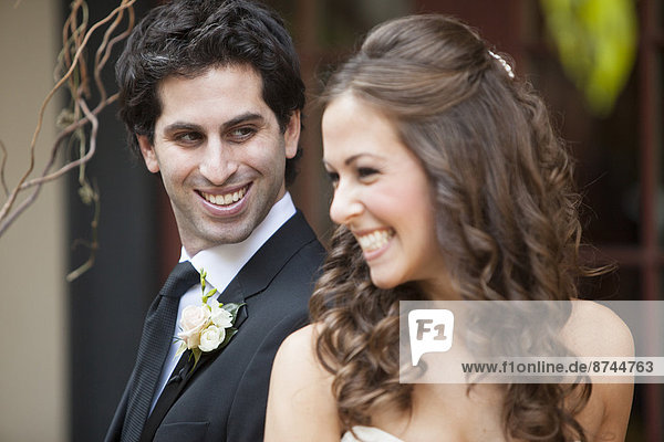 Close-up Portrait of Bride and Groom