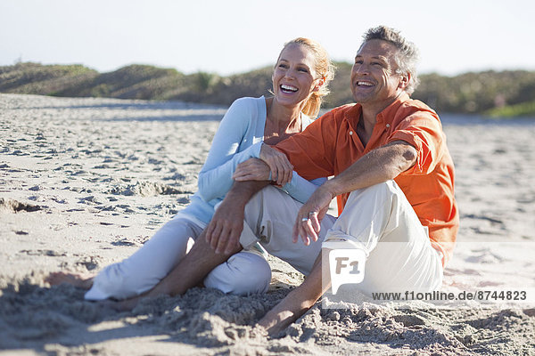 Mature Couple Sitting on Beach  Jupiter  Palm Beach County  Florida  USA