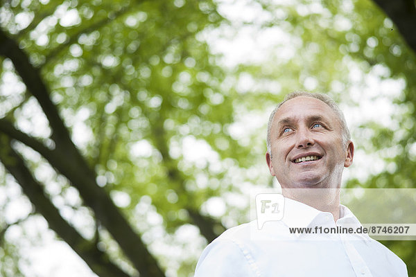 Close-up portrait of mature man in park  Mannheim  Germany