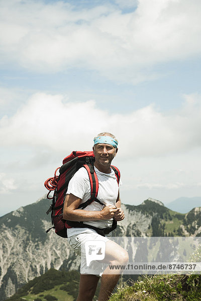 Portrait of mature man hiking in mountains  Tannheim Valley  Austria
