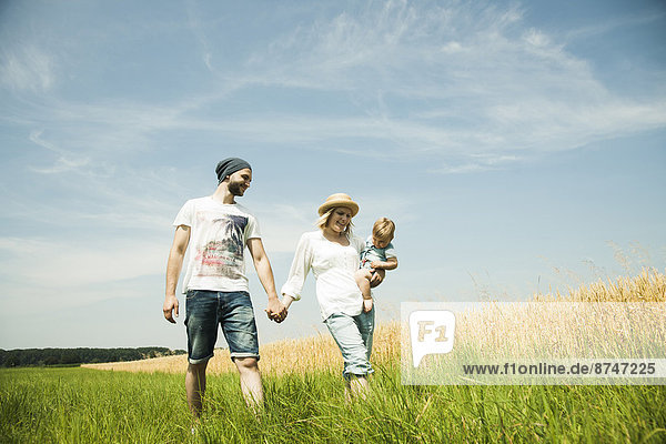 Family Walking by Agricultural Field  Mannheim  Baden-Wurttemberg  Germany