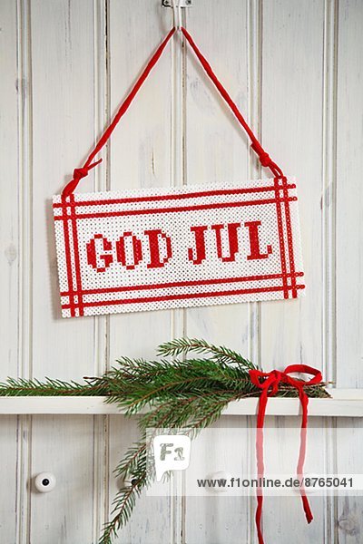 A sign with the text Merry Christmas