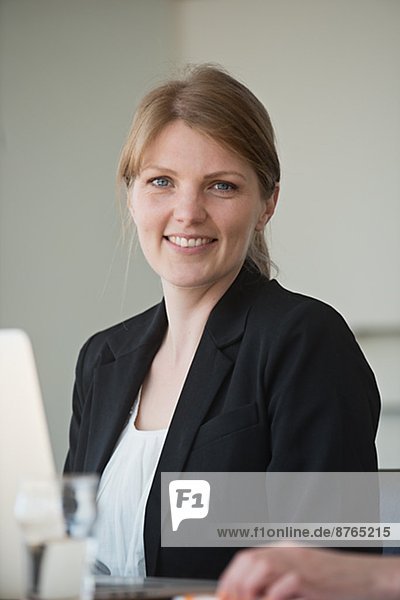 Smiling woman in conference room  Stockholm  Sweden