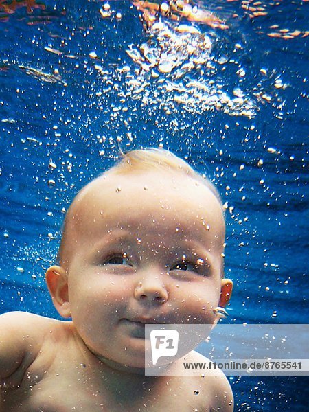 Baby swimming in swimming pool  Thailand