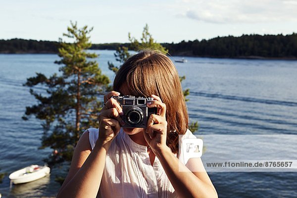 Young woman with camera  Sweden